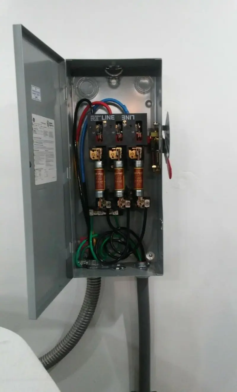 Three-phase disconnect switch installed for Smoke Detector Installation in Byron